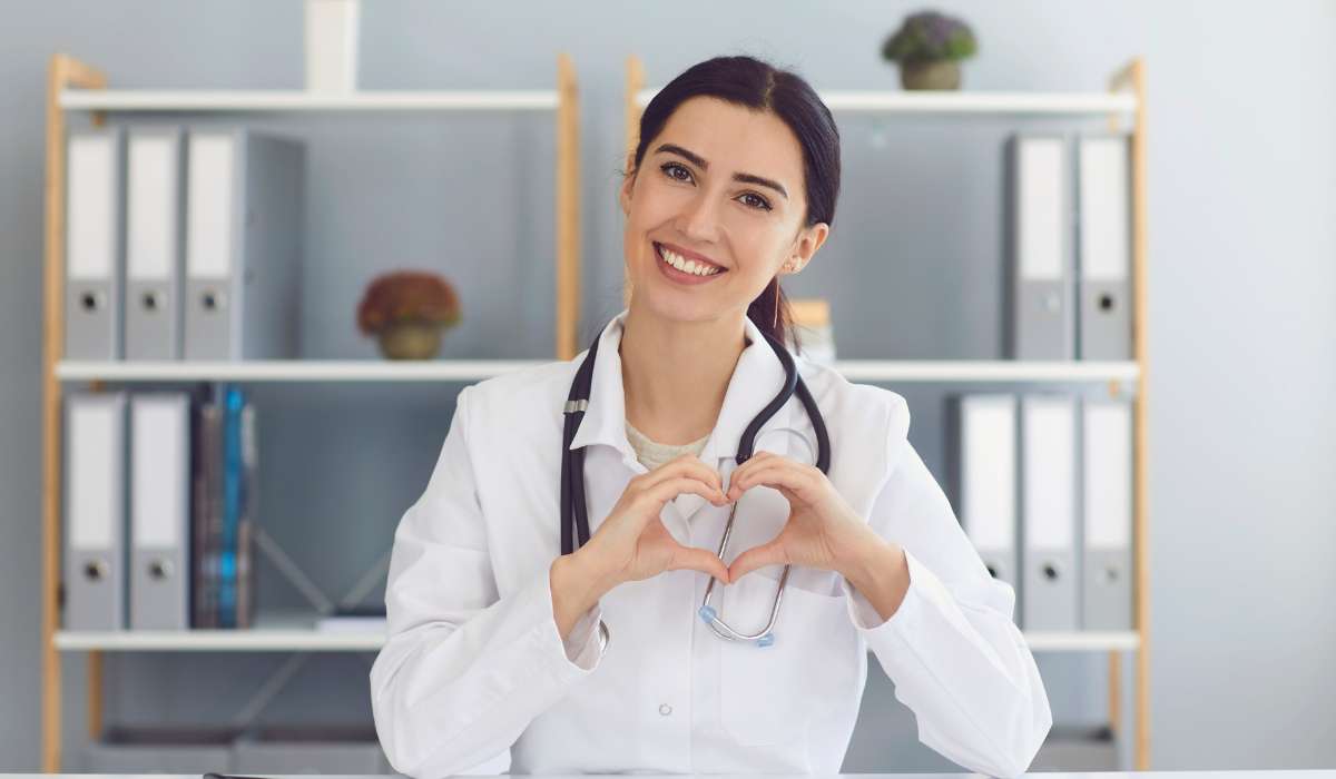 A Women smiling with good heart. Brisbane Livewell Clinic.