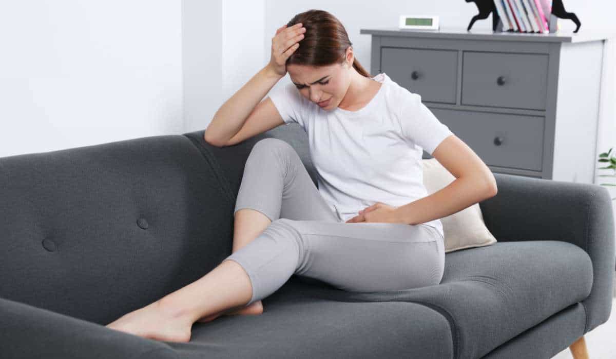 Girl having IBS Sufferers. Brisbane Livewell Clinic.