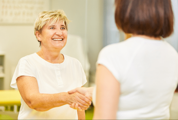 Naturopath meeting patient for initial consultation at Brisbane Livewell Clinic.