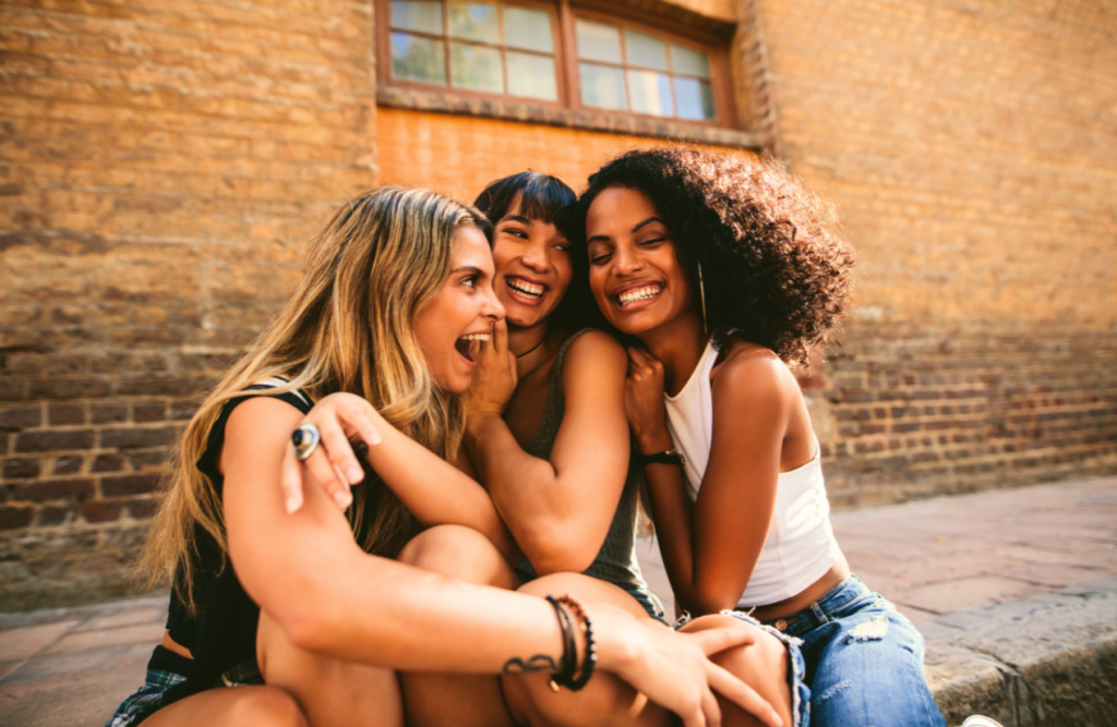 Young girls having fun on city street. Hypnotherapy FAQs. Brisbane Livewell Clinic. Naturopath Brisbane Northside