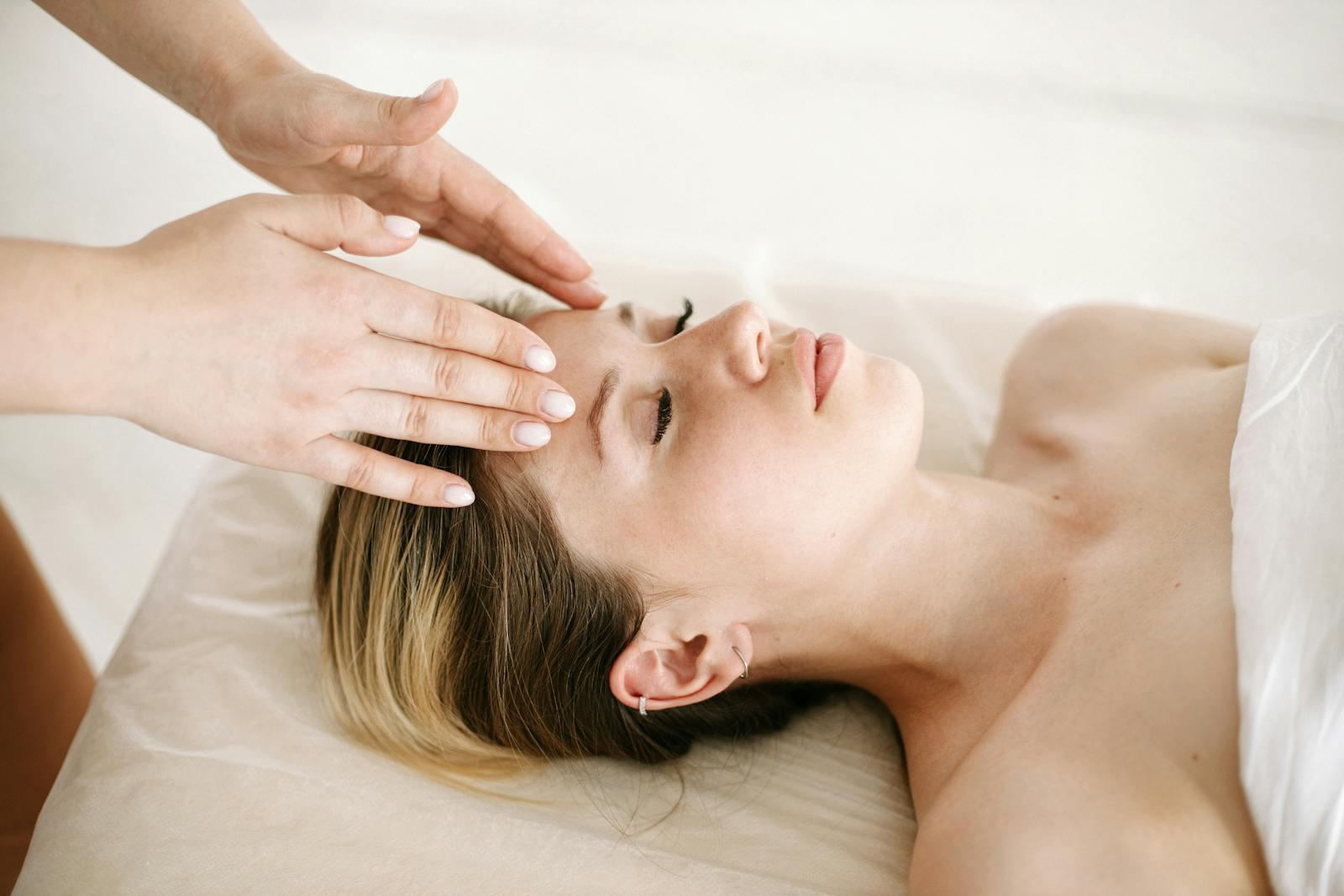 Woman Having a Head Massage in Brisbane at Brisbane Livewell Clinic