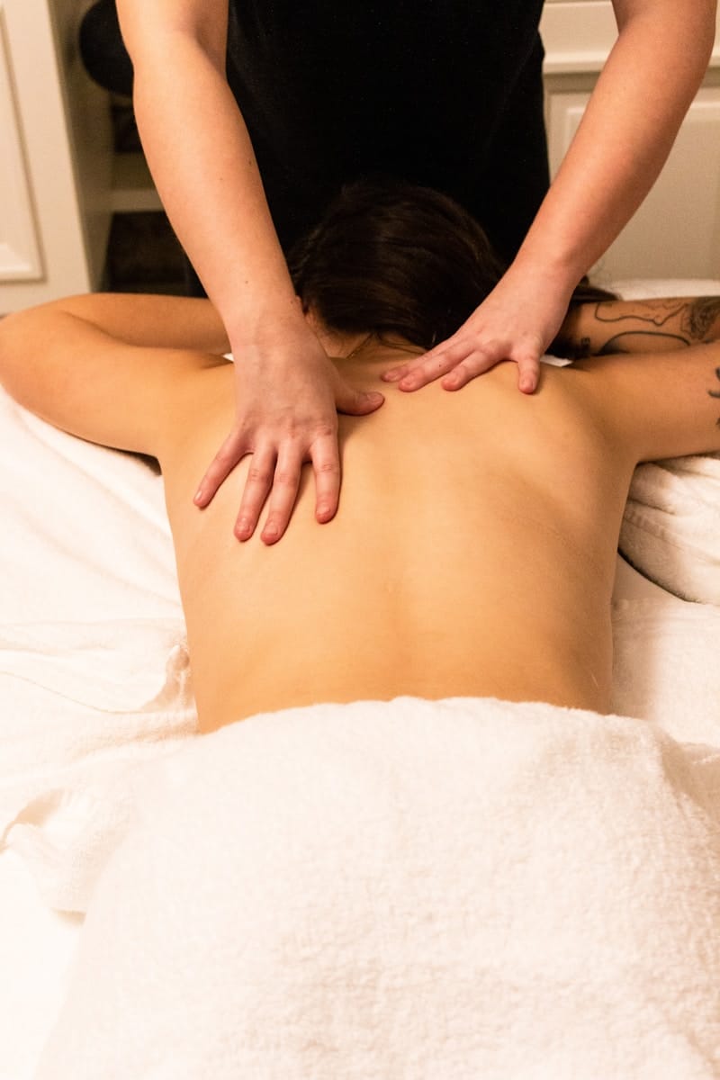 A woman getting a back massage. Remedial Massage. Brisbane Livewell Clinic.