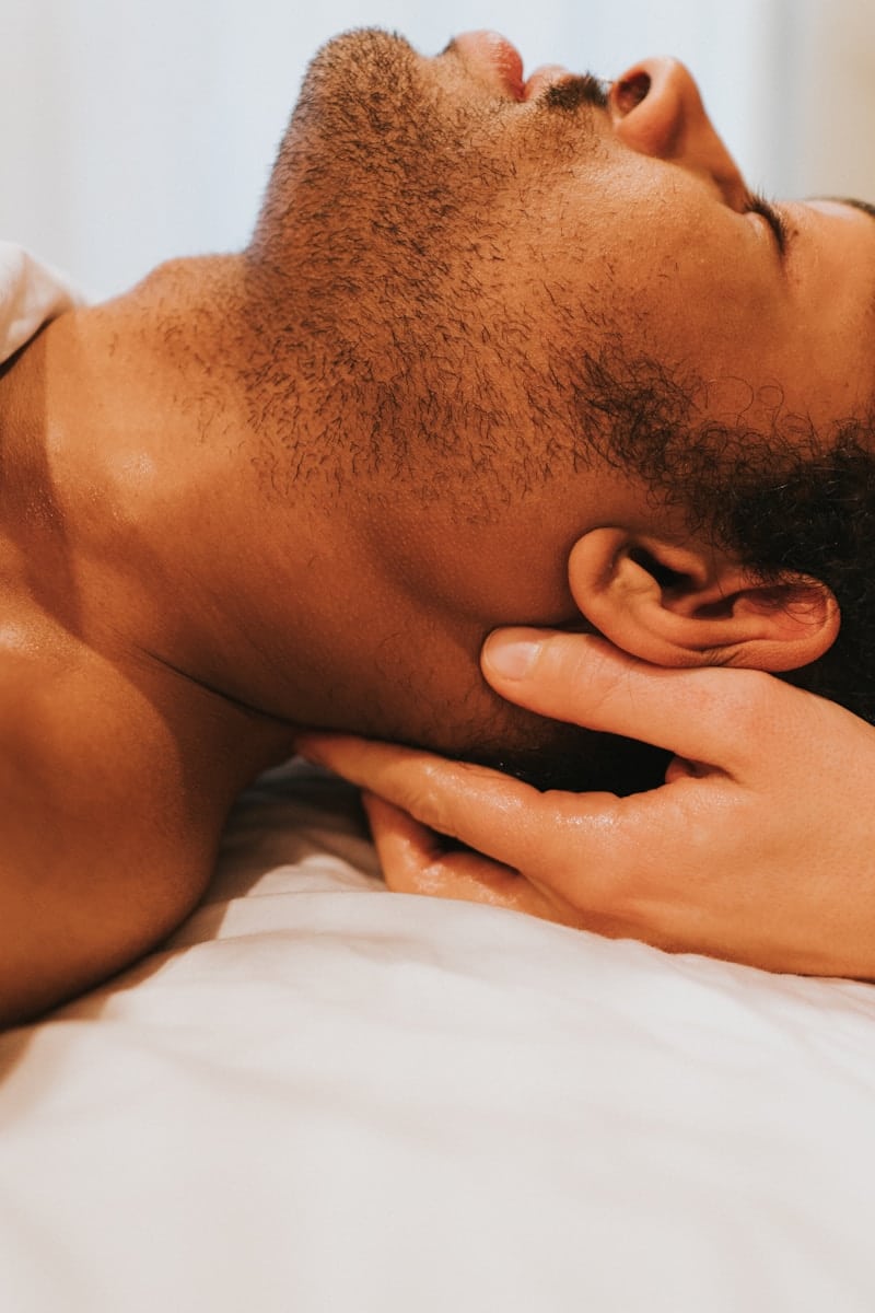 A man getting a remedial massage. Brisbane Livewell Clinic.