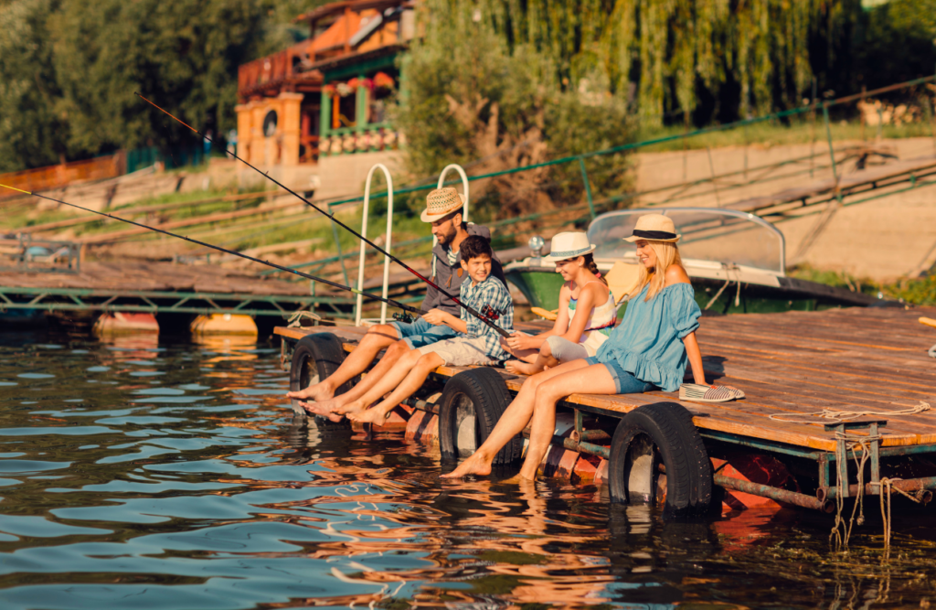 Family fishing together by the lake. Hypnotherapy services. Brisbane Livewell Clinic