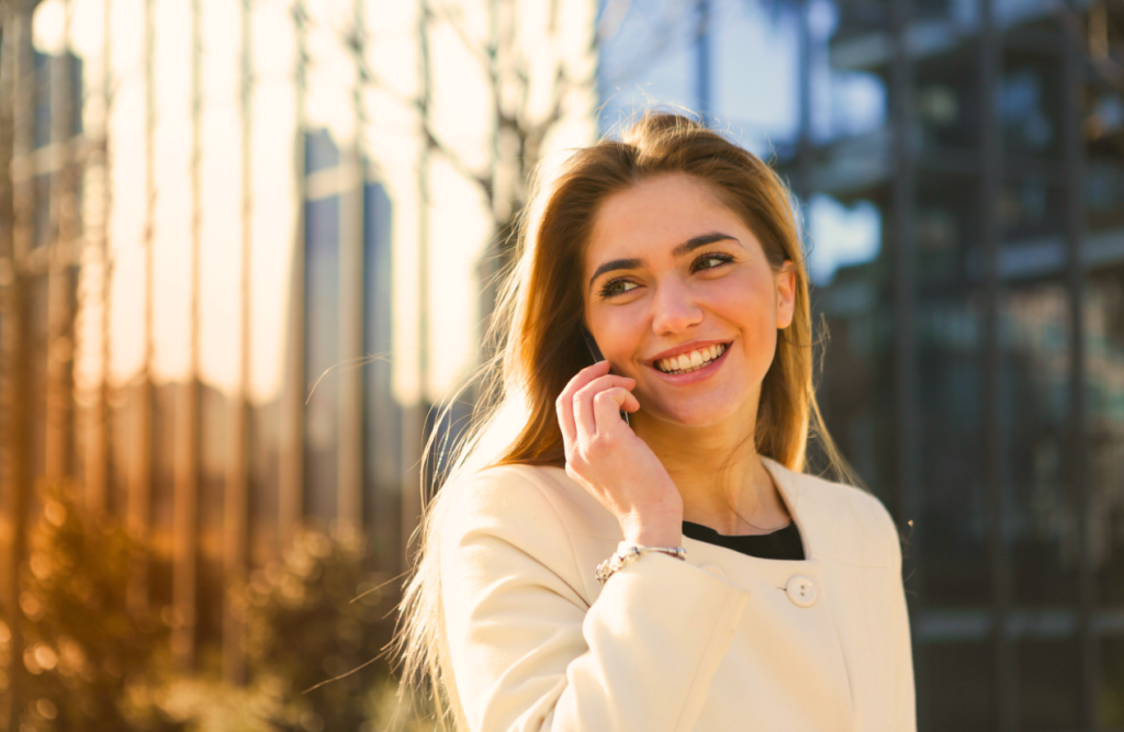 Woman talking on the phone. Hypnotherapy services. Brisbane Livewell Clinic