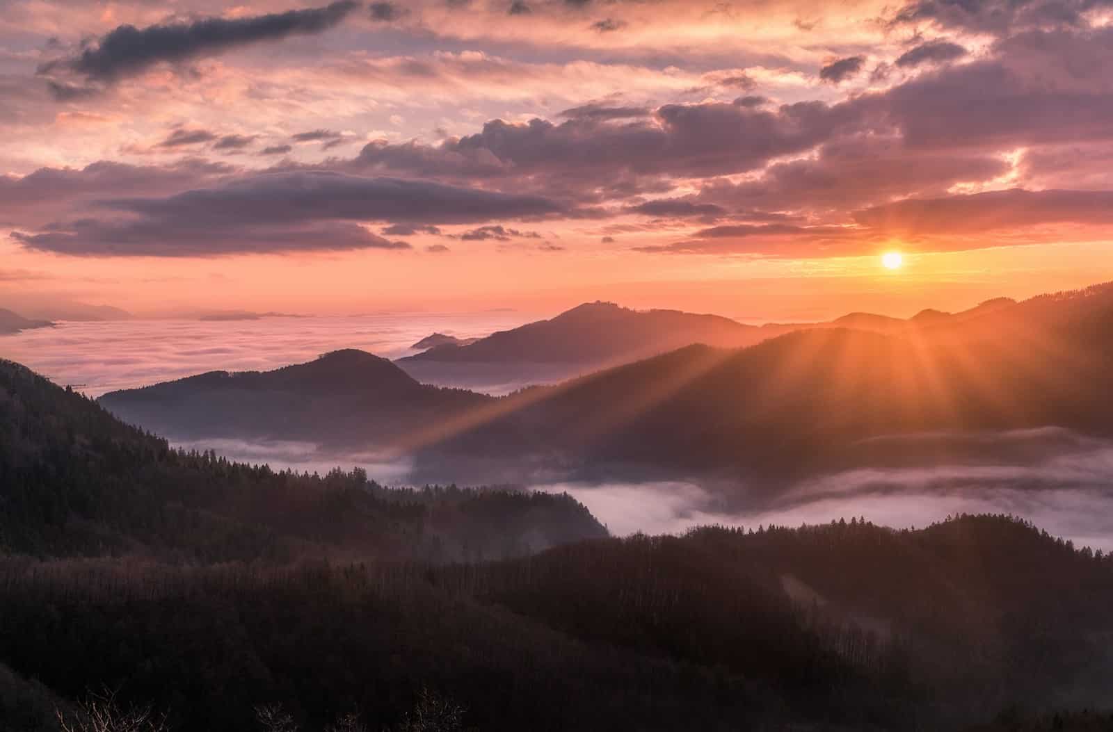 overlooking view of mountains and sunrise. Mindset therapy within Australia