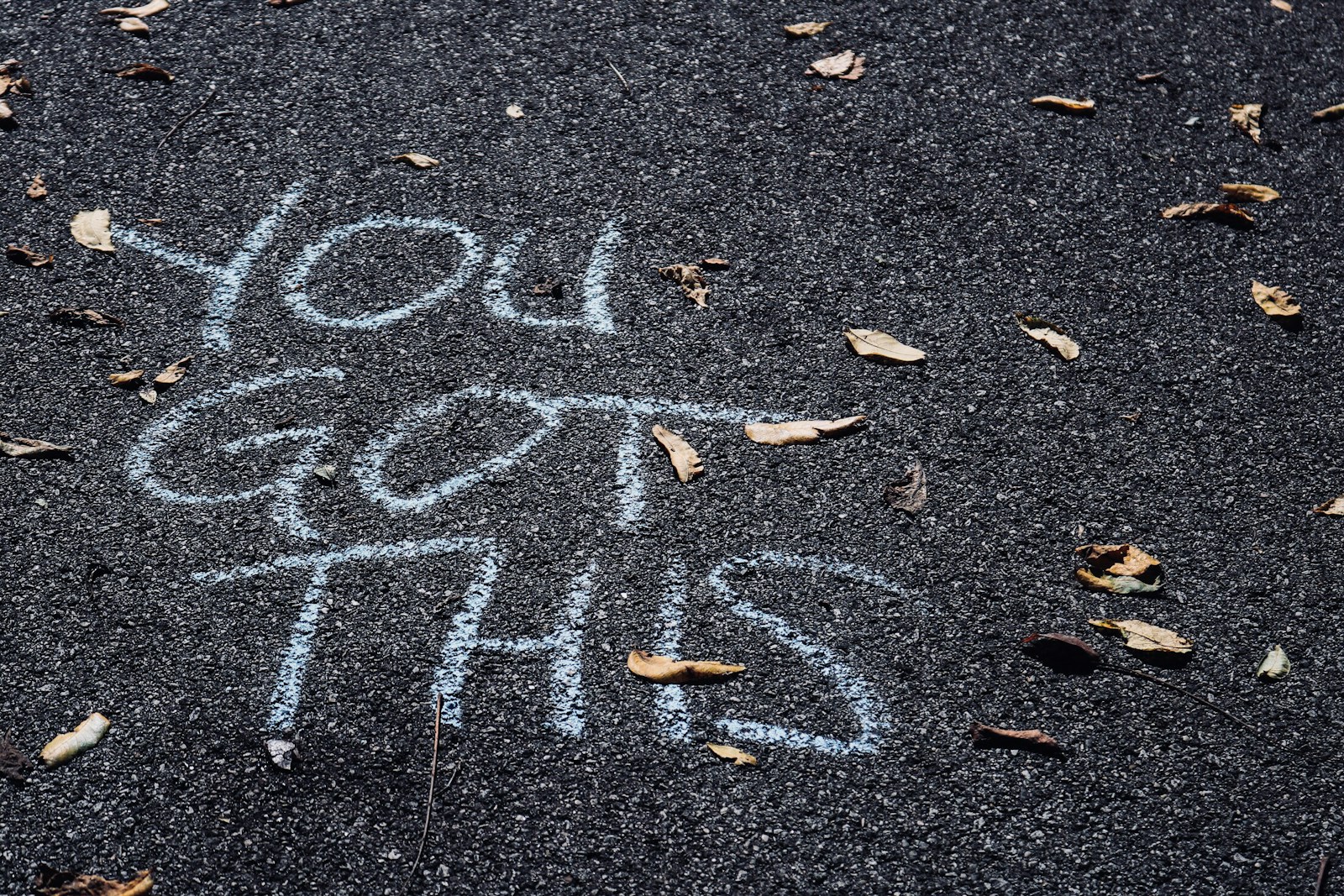 You got this! Mindset Therapy. Words in chalk on bitumen