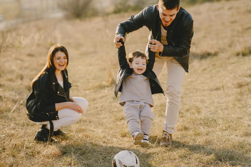 Photo of Family Having Fun With Soccer Ball. Dietitian Wavell Heights