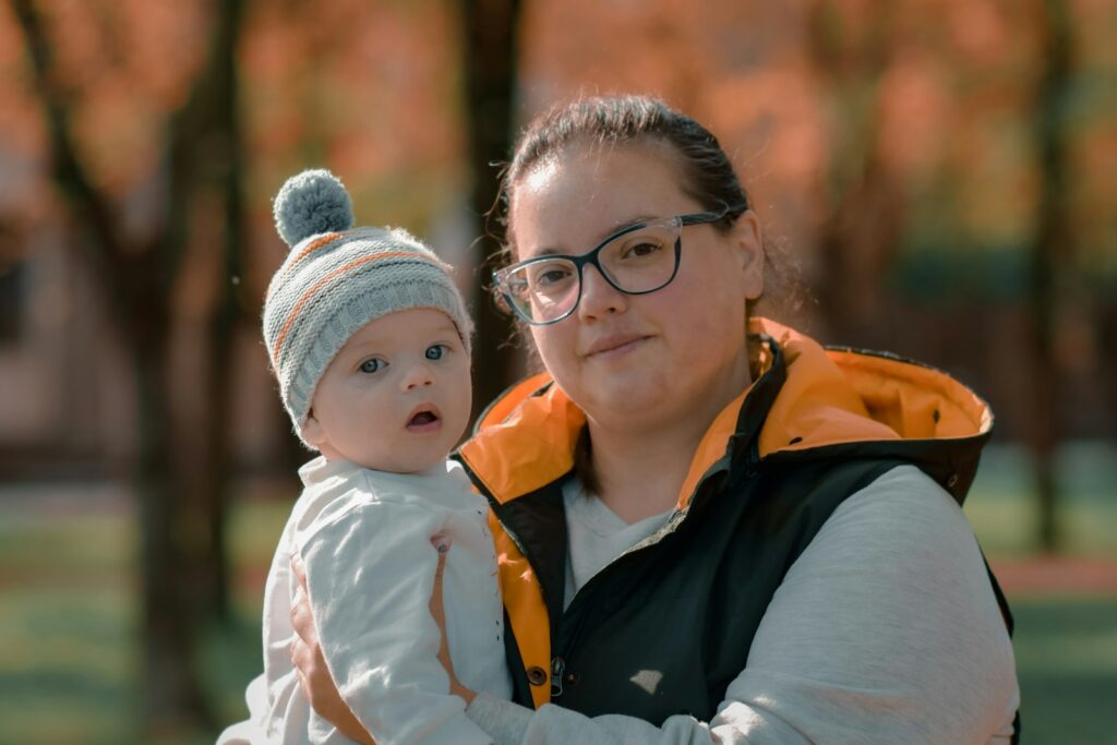 Mother holding a baby. Dietician for Weight Loss