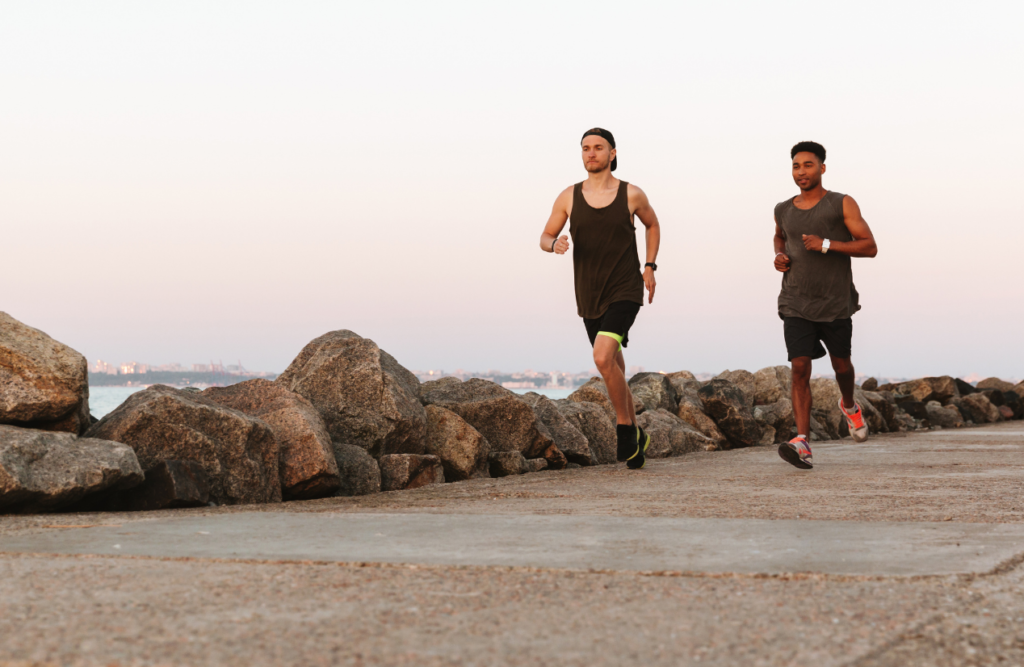 Two men running along the esplanade. Methylation Testing. Brisbane Livewell Clinic