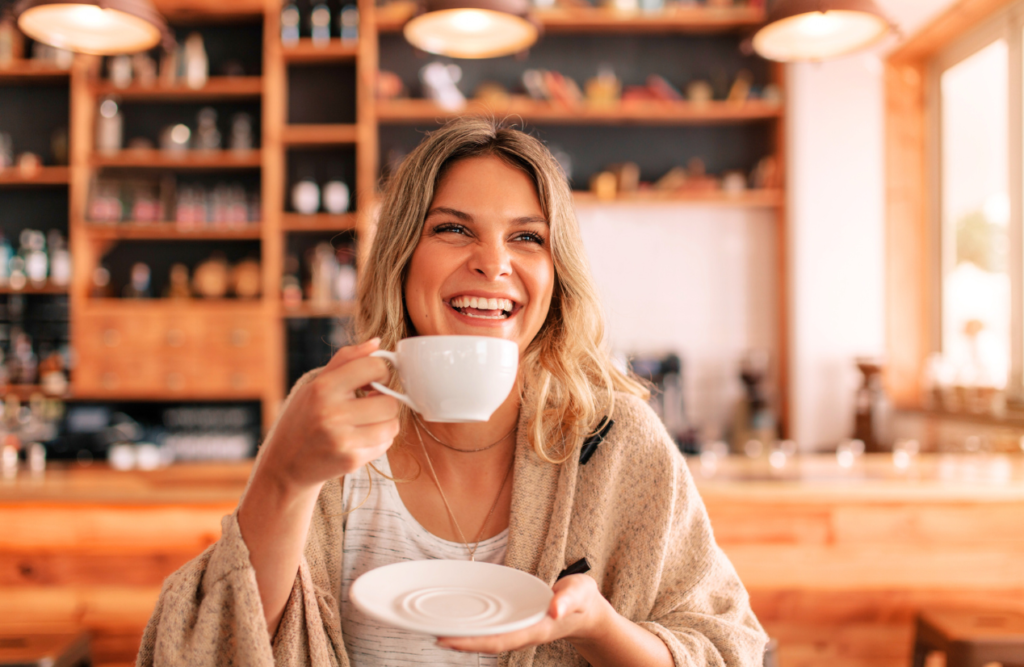 Woman enjoying her cup of coffee. Swedish Massage Brisbane. Brisbane Livewell Clinic