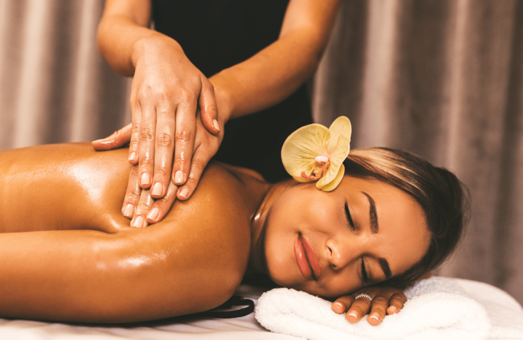 Woman receiving back massage using gentle strokes. Swedish Massage Brisbane. Brisbane Livewell Clinic. What is Myofascial Release Therapy?