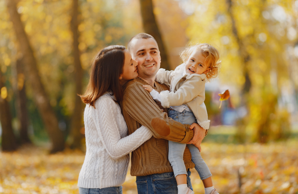 A cheerful family of three at the park. Iridology. Brisbane Livewell Clinic. Northgate Brisbane. Can a Naturopath help with my health issues