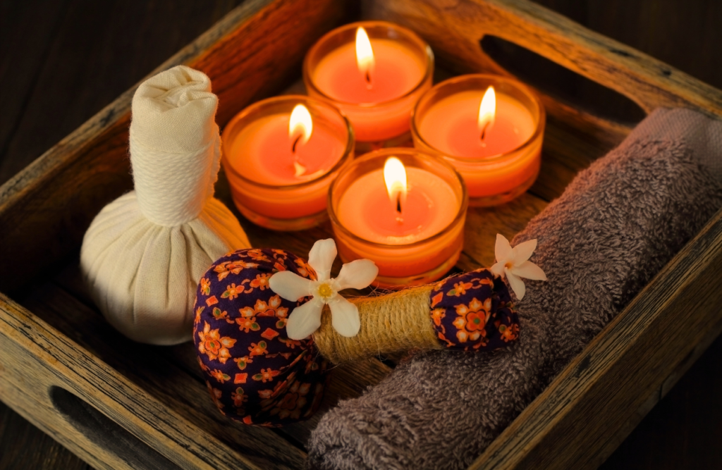 Candles, towel, and Luk Pra Kob for massage. Thai Massage. Brisbane Livewell Clinic