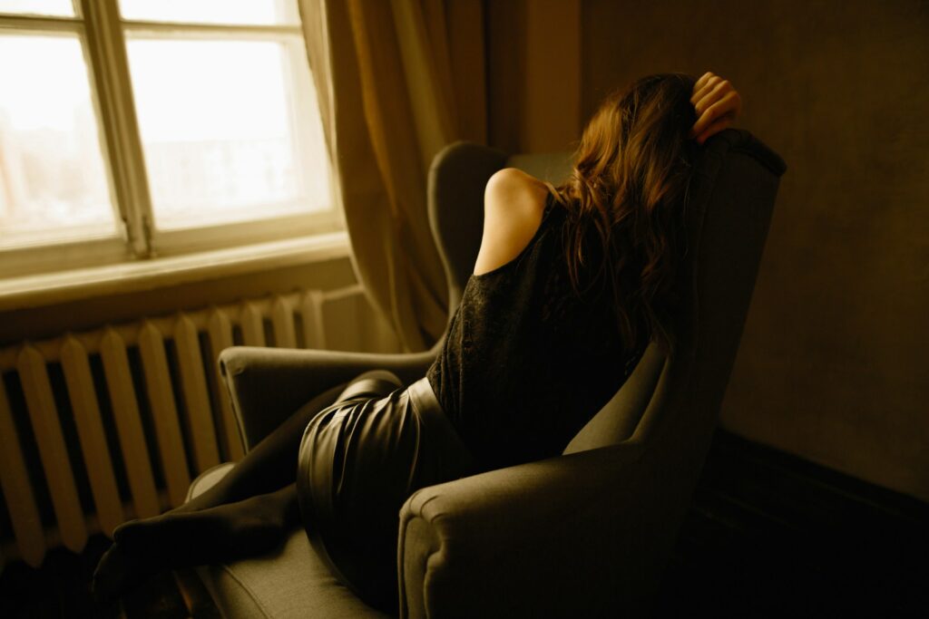 Woman lying on a chair with fatigue and brain fog. Heavy Metal Detoxification and Detoxing Heavy Metals