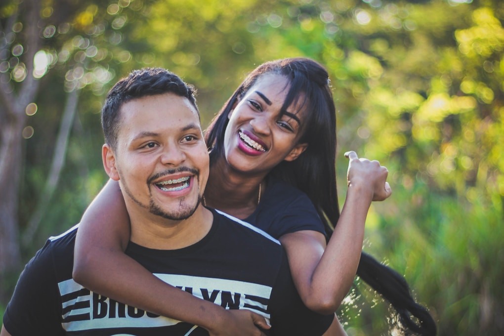 Man and woman hugging. Acupuncture Brisbane. Can a Naturopath help with my health issues