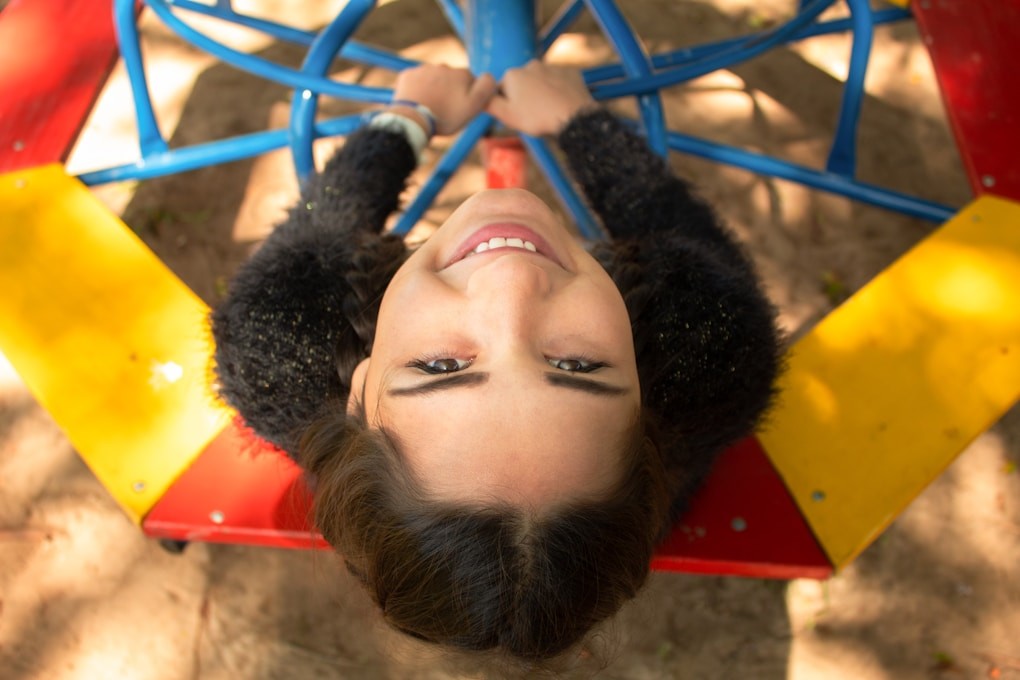 Girl coming down a slide. What is a Counsellor?