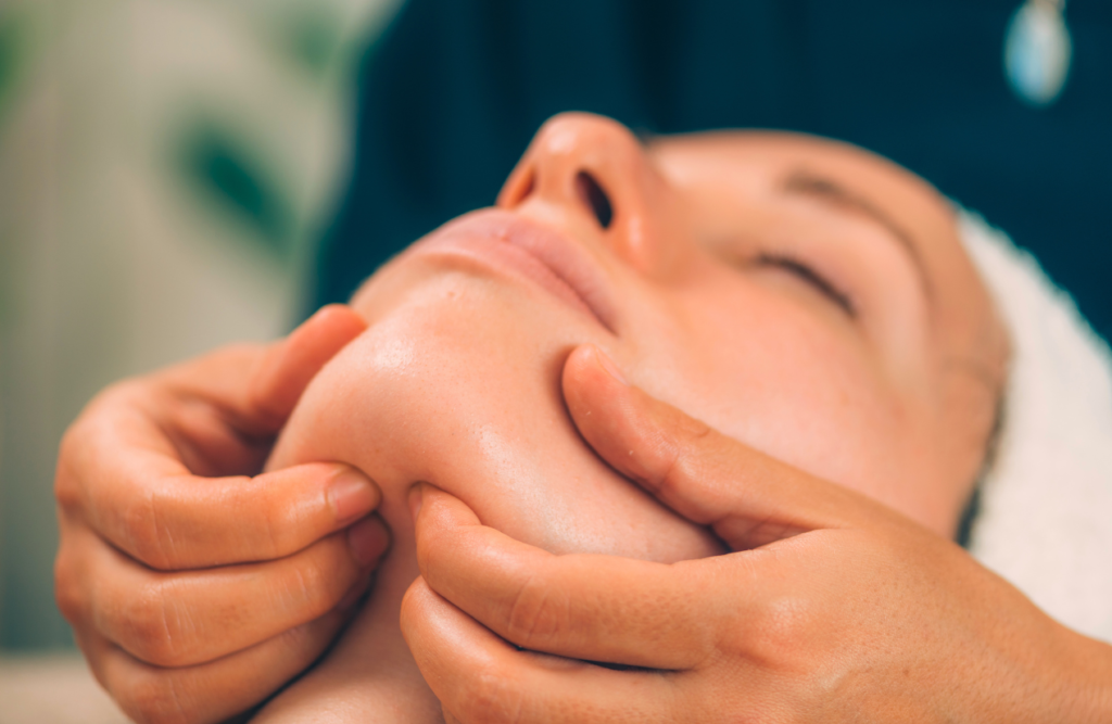 Woman receiving face Massage Clayfield. Lymphatic Drainage Massage. Brisbane Livewell Clinic