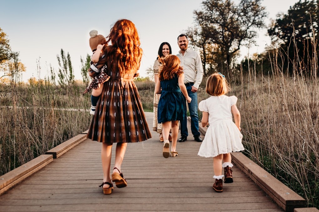 Family walking along a path after recovery from viral infection through Naturopathy