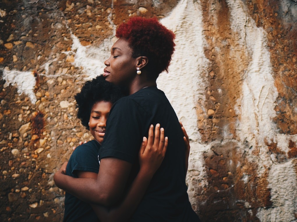 Mother hugging daughter. What is Counselling?