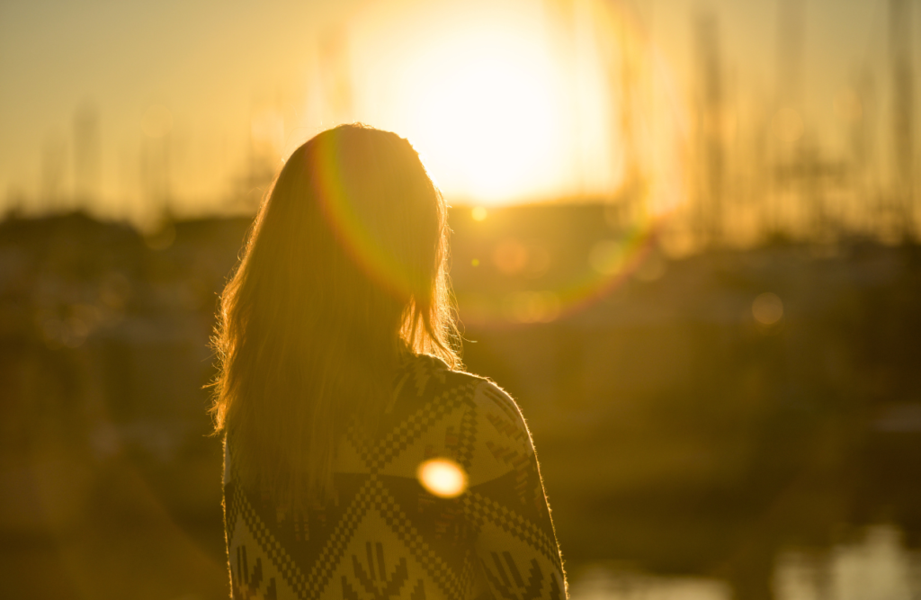 Woman standing facing the sun. Iridology. Brisbane Livewell Clinic. Counsellor Wavell Heights