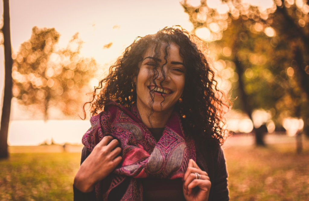 Woman looks happy after seeing the effectiveness of Hypnotherapy. Power of Hypnosis. Brisbane Livewell Clinic