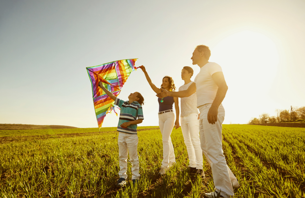 Family playing with kite. Hypnosis sleep. Brisbane Livewell Clinic