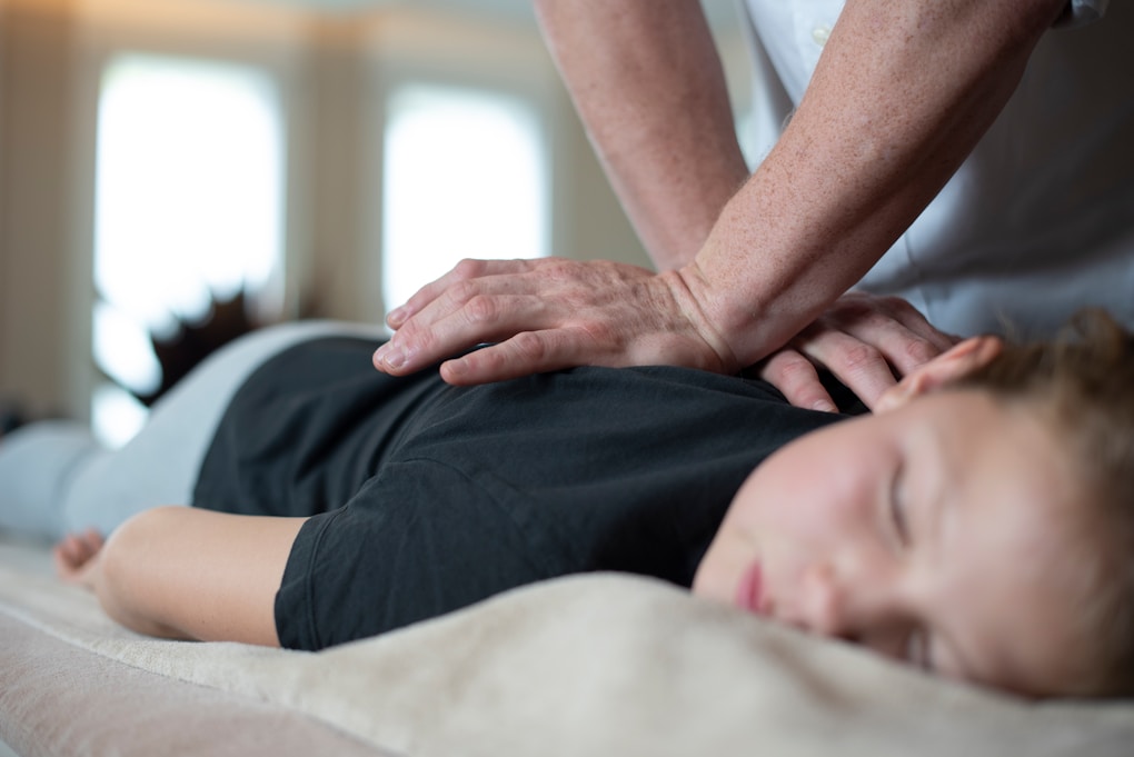 Woman getting a back massage. What is Myofascial Release Therapy?